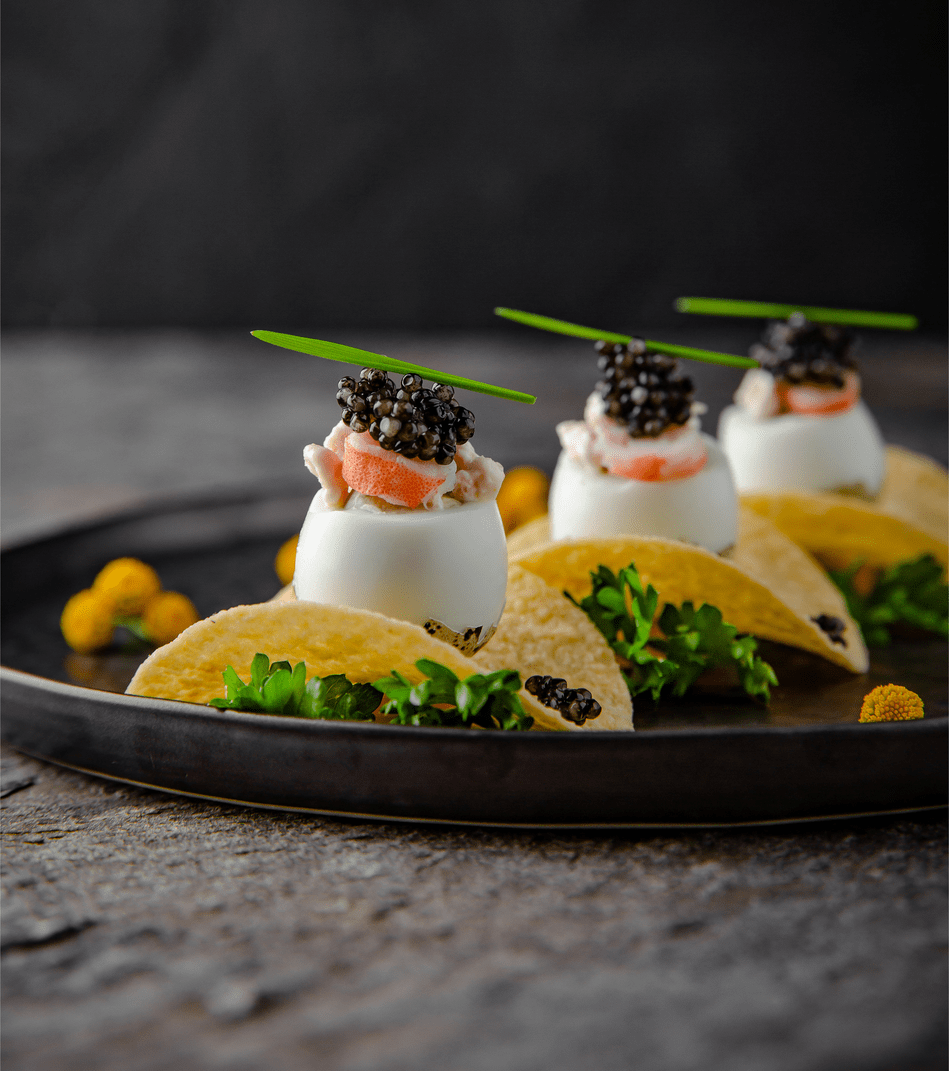 How can caviar be presented