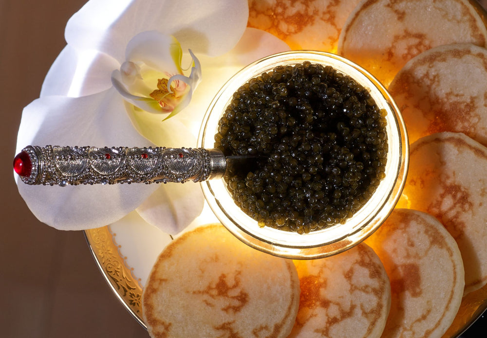 The question is whether to eat vodka with caviar or drink caviar with vodka.