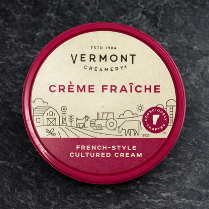 Vermont Creamery Crème Fraçèche container on a dark background